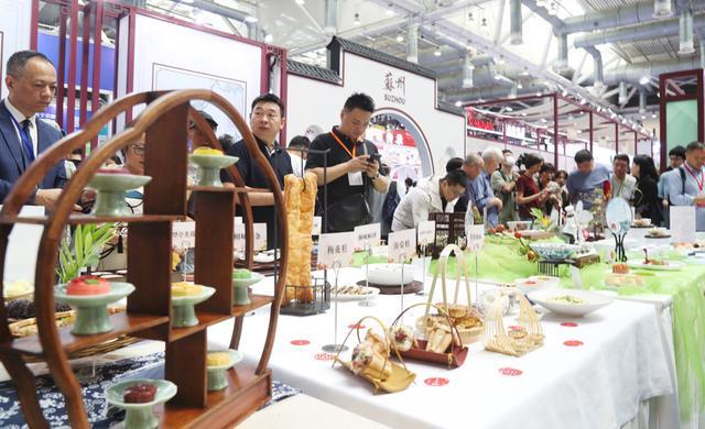 九游app入口：中外美食汇苏州第34届中国厨师节开幕(图2)