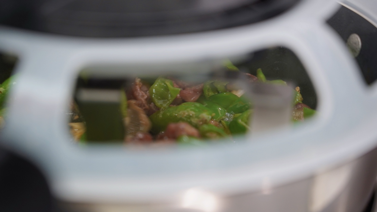 锅圈食品：以智能炒菜机打开中餐标准化新空间(图1)